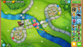 Quincy shooting at Bloons