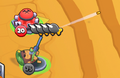 Sniper Monkey attacking (player's Sniper)